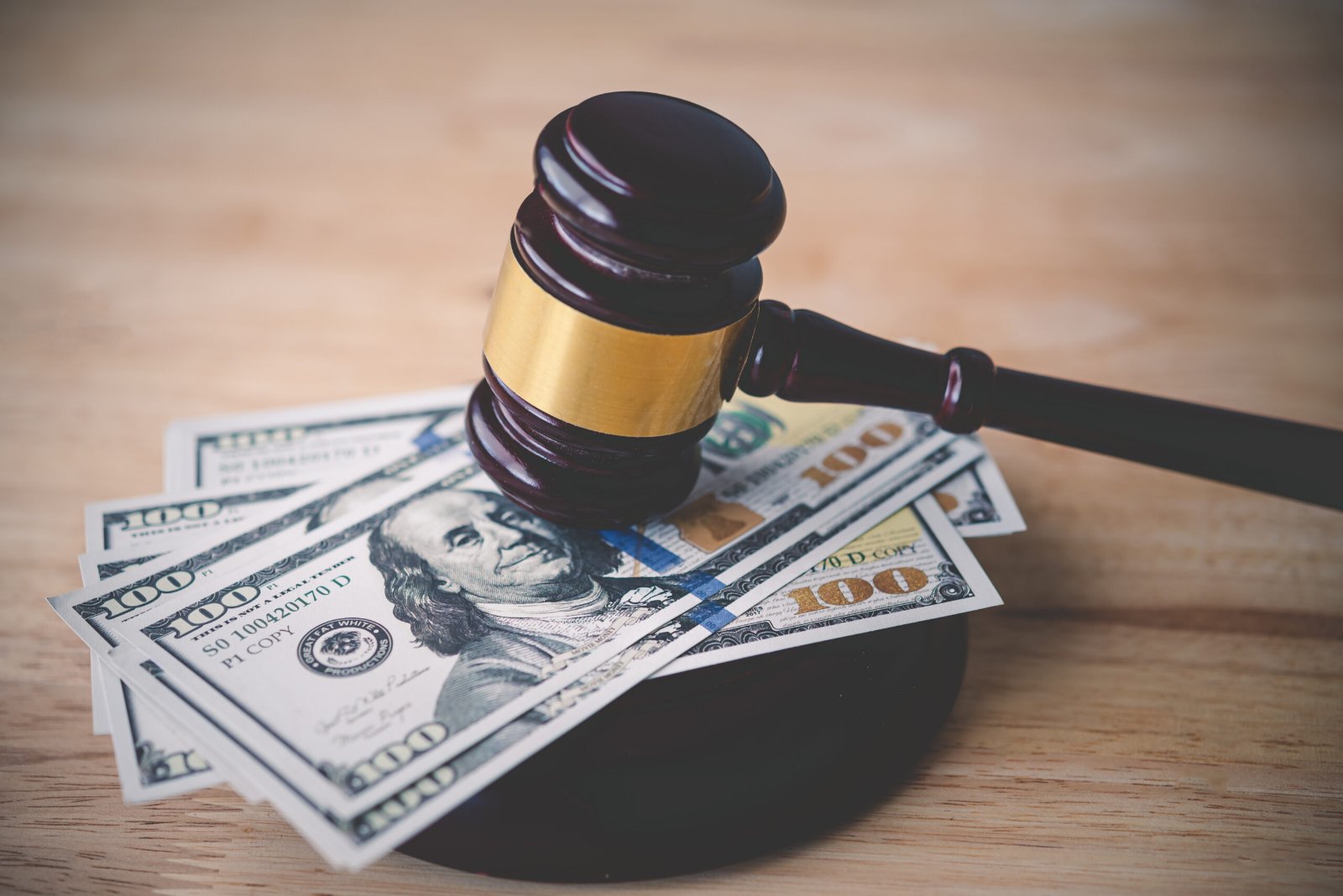 law-and-justice-concept-judge-hammer-with-the-dol-2022-11-19-01-35-06-utc-scaled